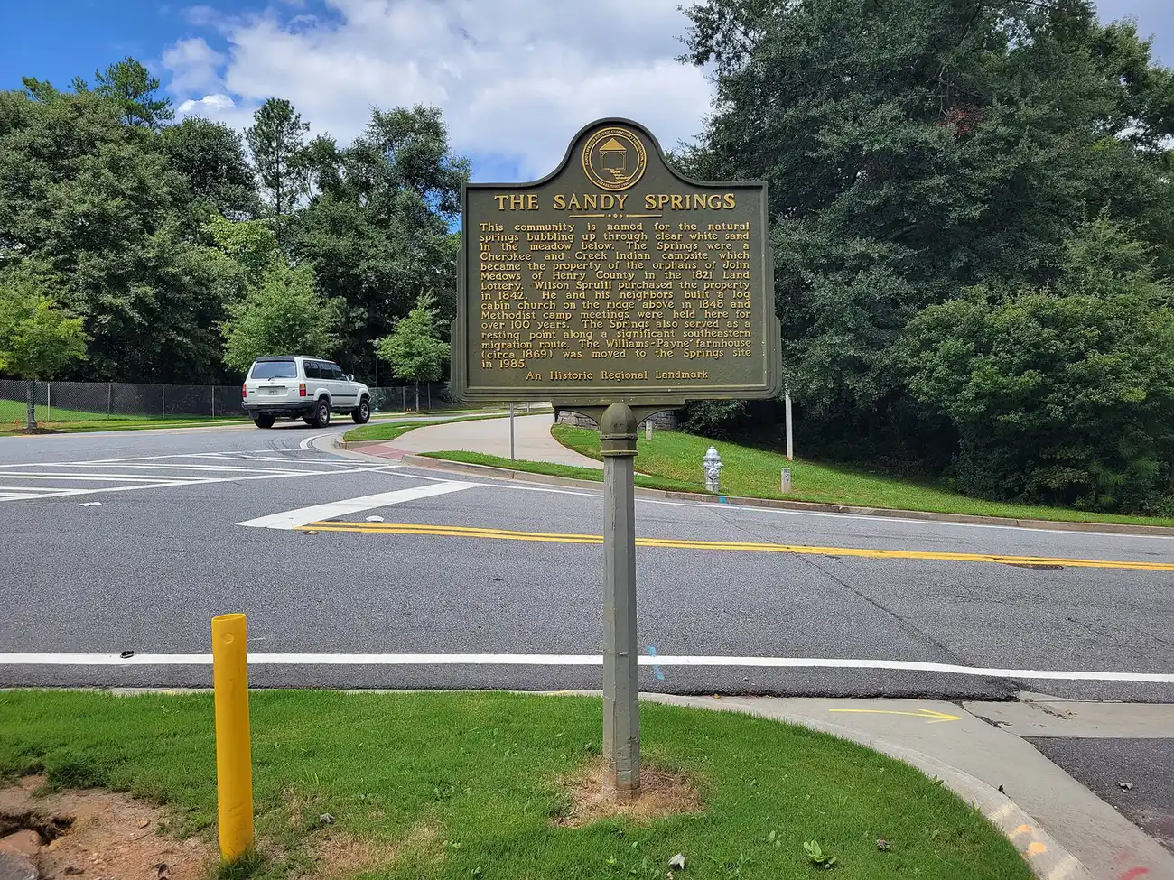 The Sandy Springs historical marker at Sandy Springs Circle and Hilderbrand Drive
